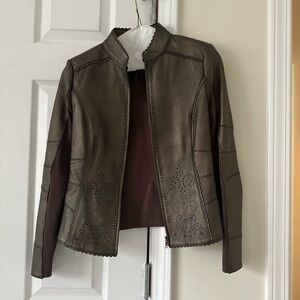 Nygard Bronze leather jacket.Great  with jeans, dresses and turtle necks.